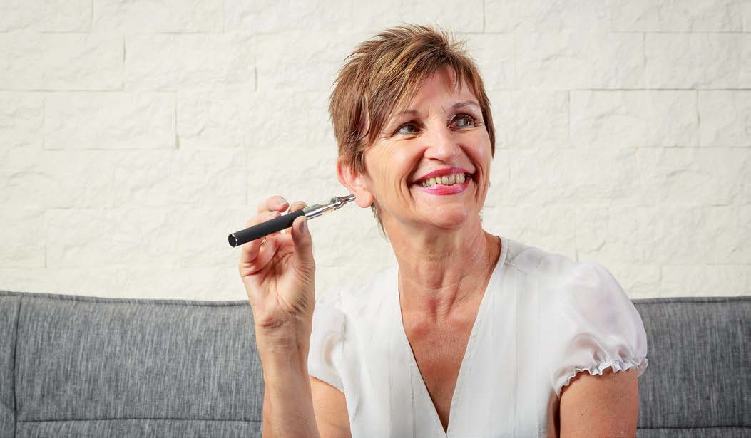 Women with a vaping device